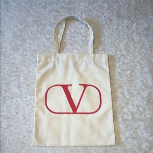 Valentino Ivory Tote with Bold Red Emblem